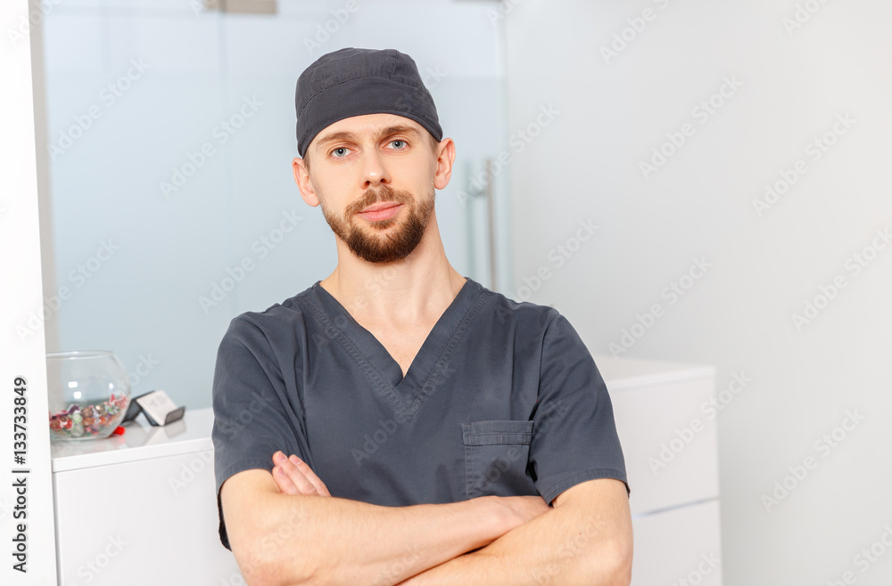 Happy friendly doctor in clinic