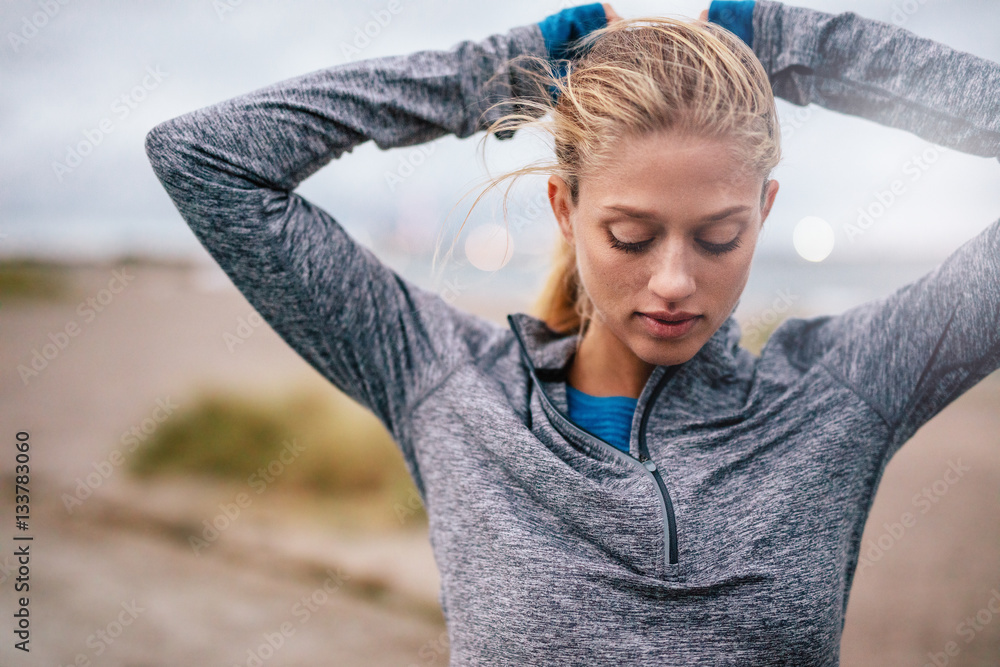 Young woman getting ready for training