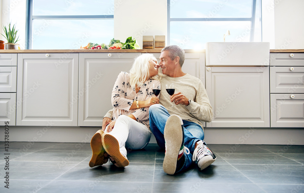 Cute senior husband and wife kissing