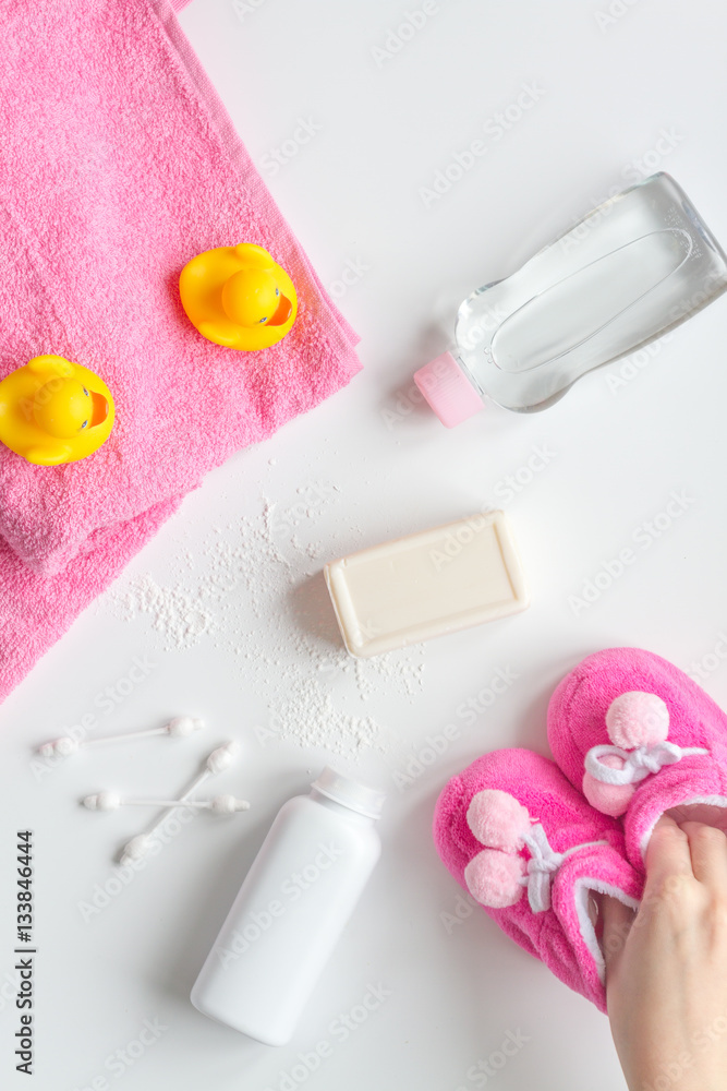 baby accessories for bath with duck on white background