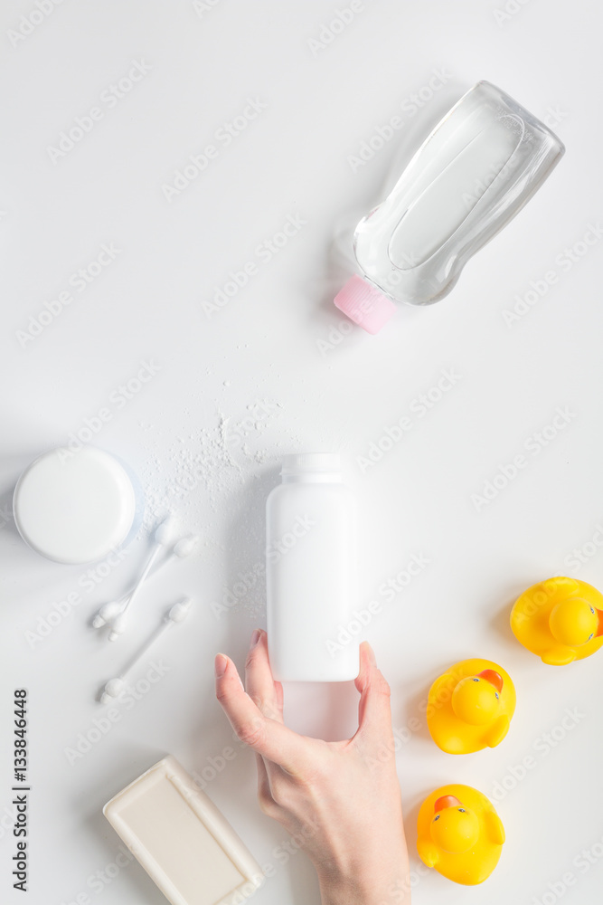 baby accessories for bath with duck on white background