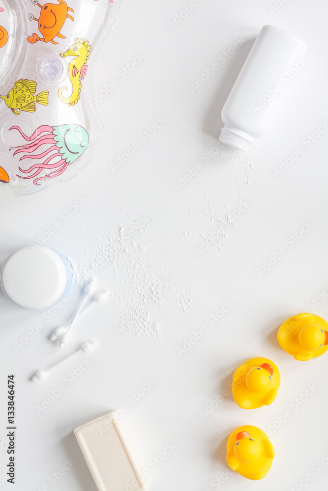 baby accessories for bath with duck on white background