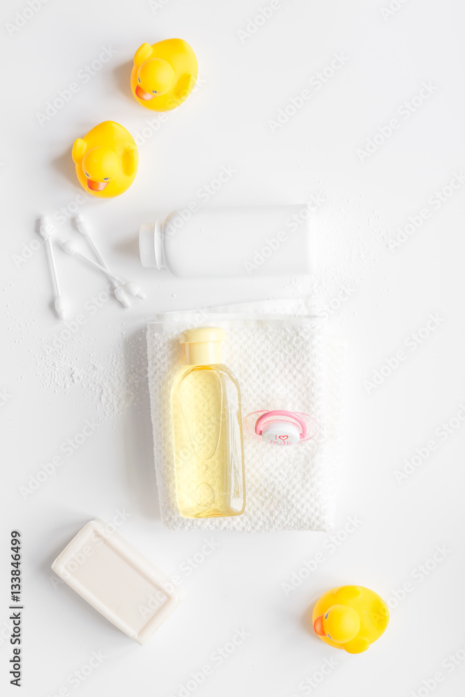 baby accessories for bath with duck on white background