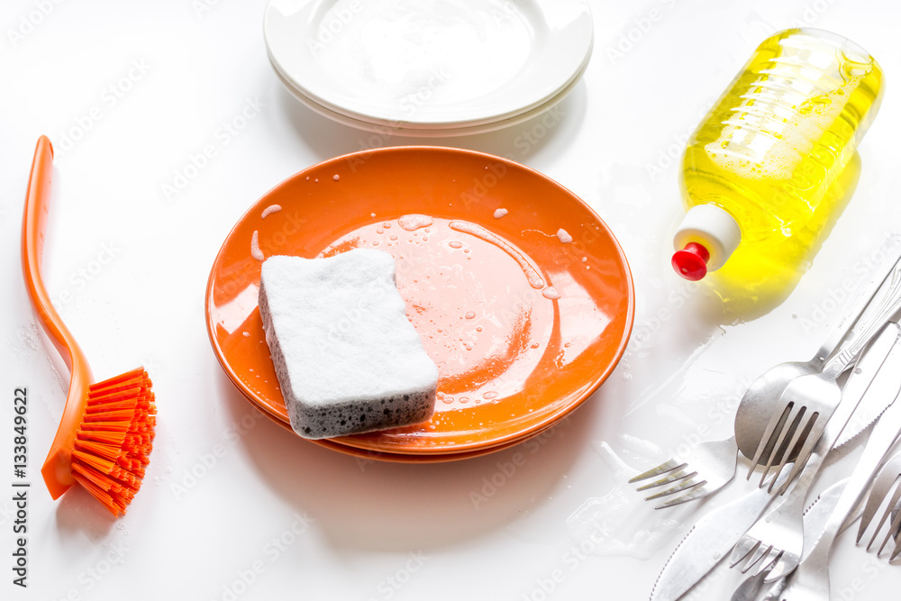 concept of washing dishes on white background