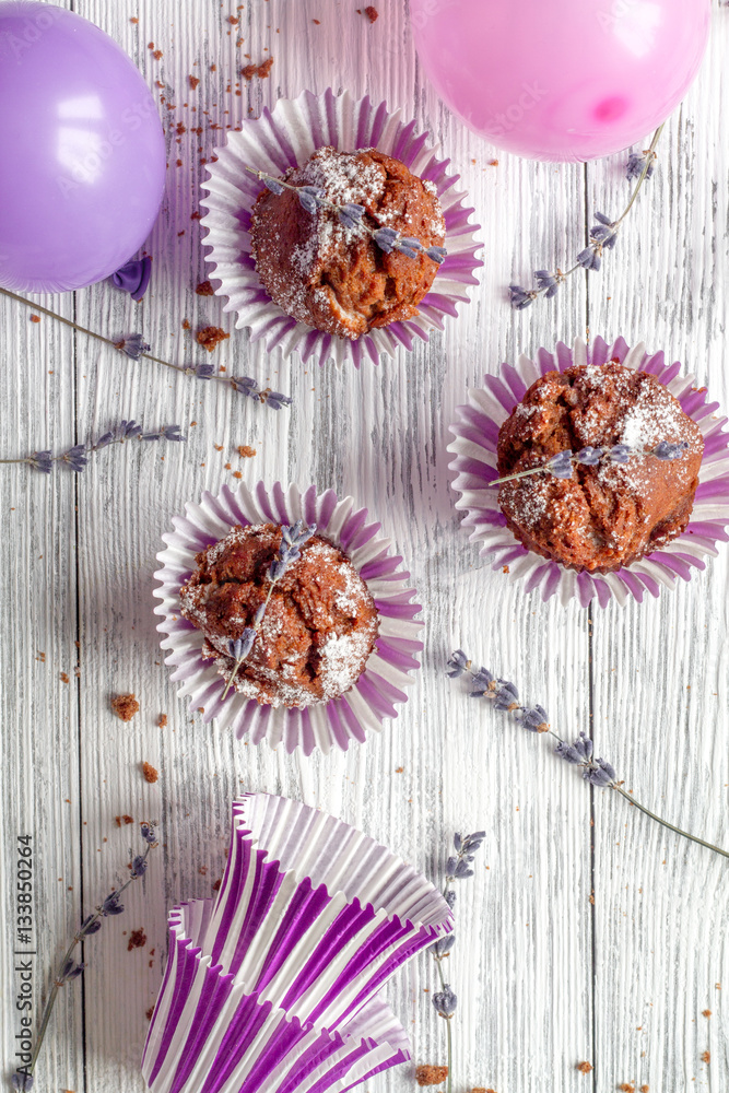 concept of Valentines Day cupcakes wooden background top view