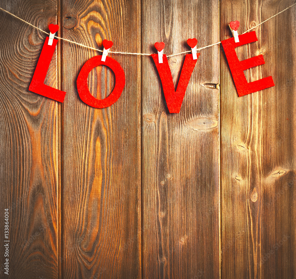 background of  Valentines Day. red hearts on wooden