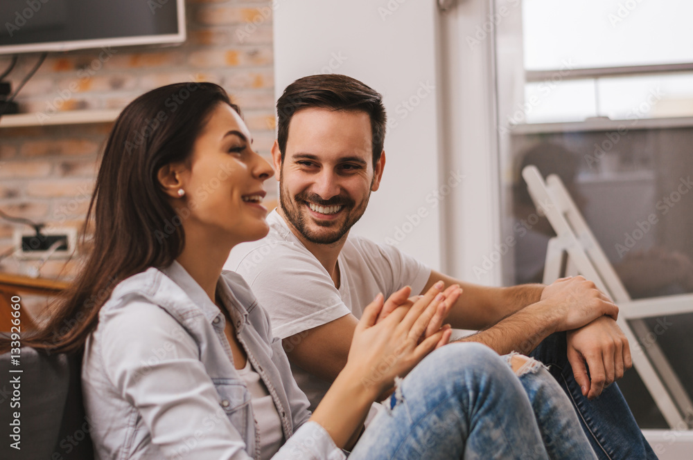 Cheerful happy couple having great time together