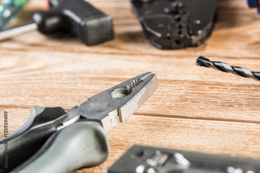 Carpentry tools on wooden surface