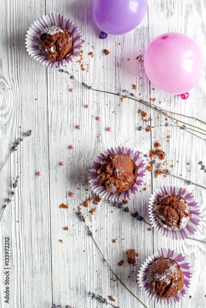 concept of Valentines Day cupcakes wooden background top view