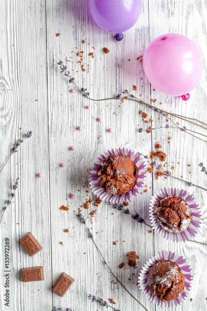 concept of Valentines Day cupcakes wooden background top view