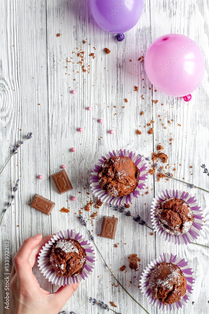 concept of Valentines Day cupcakes wooden background top view