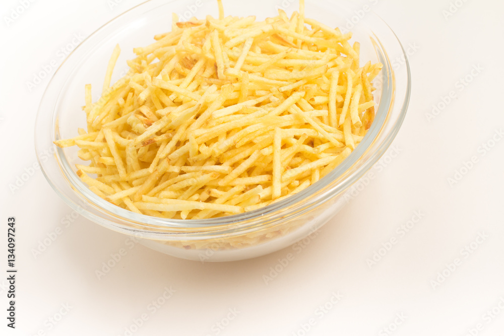 Potato Sticks into a bowl