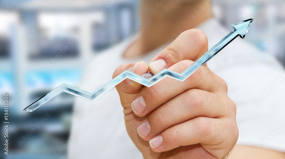 Businessman drawing digital blue arrow with a pen 3D rendering