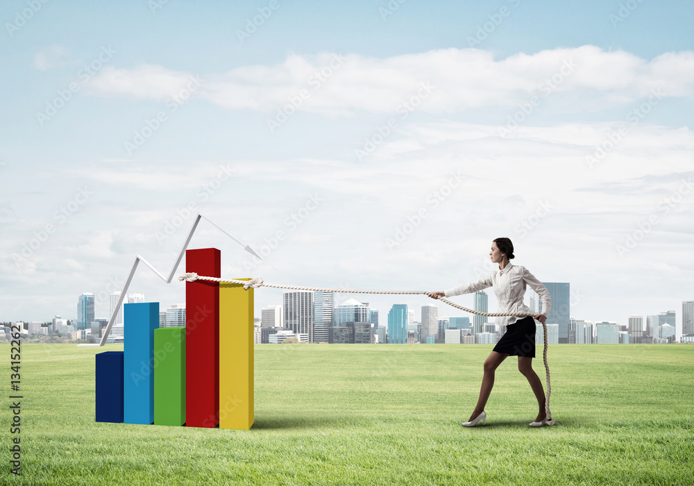 Businesswoman pulling arrow with rope and making it raise up