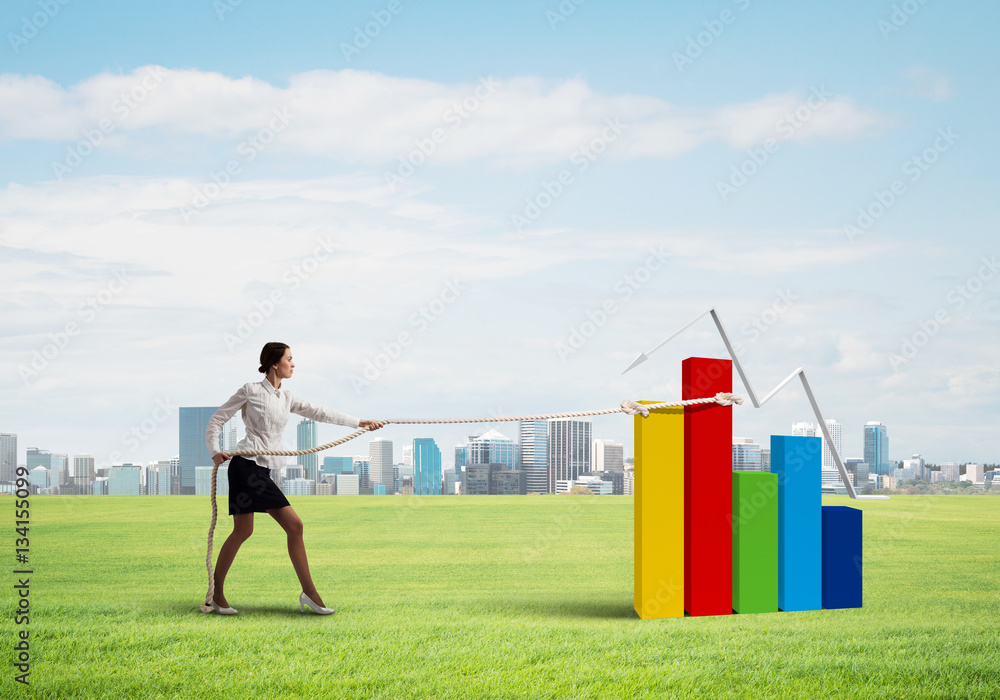 Businesswoman pulling arrow with rope and making it raise up