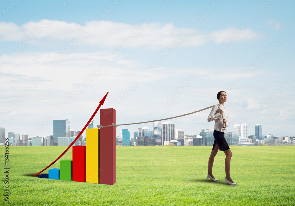 Businesswoman pulling arrow with rope and making it raise up