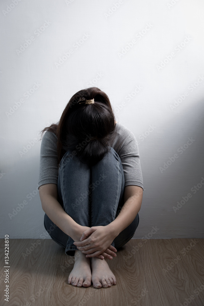 depression woman sit on floor