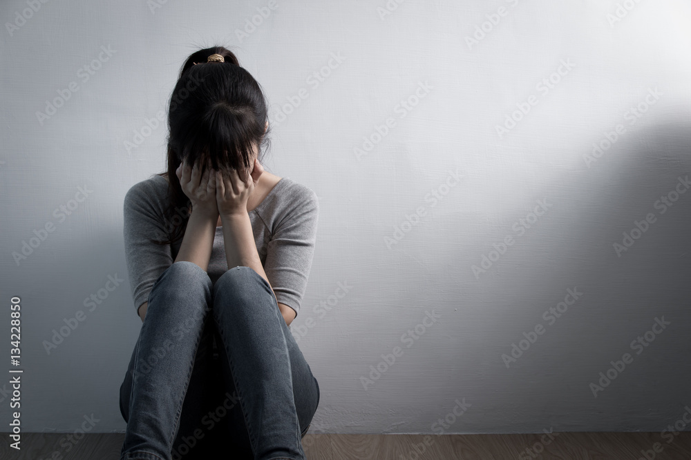 depression woman sit on floor