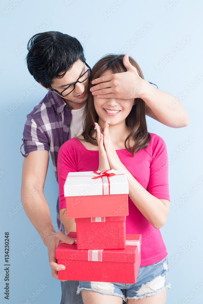 young couple with gift