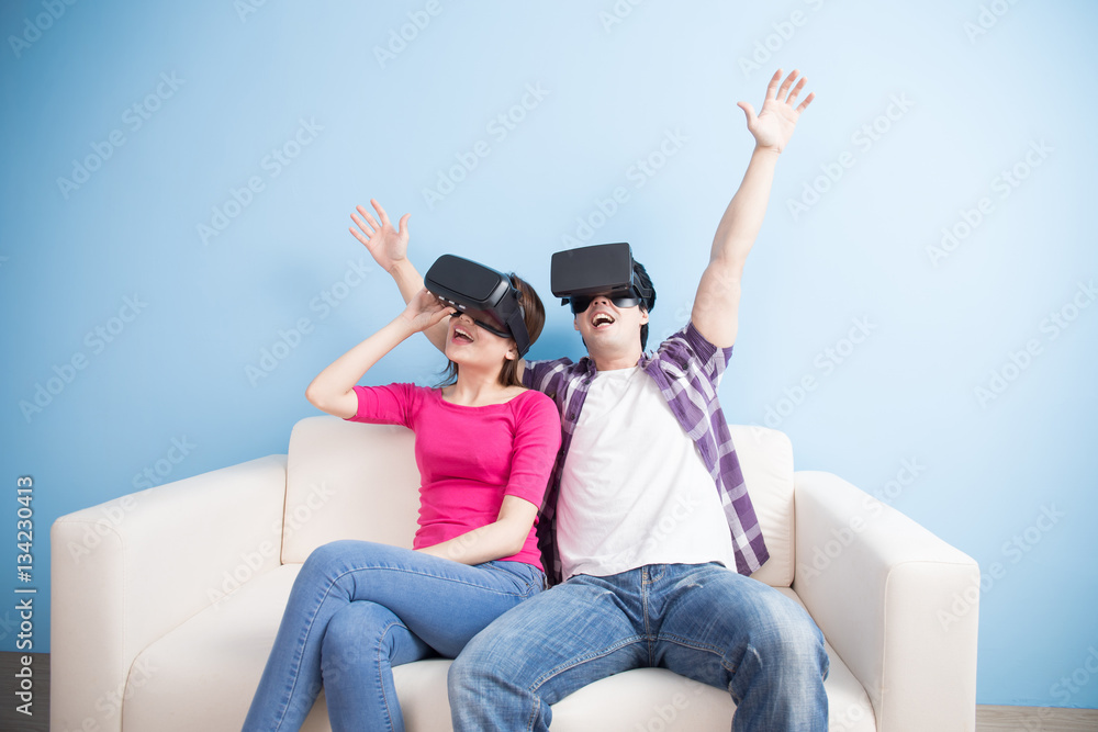 young couple play vr game