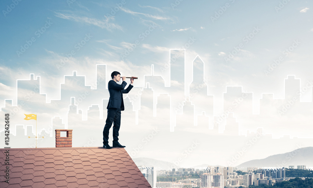 Engineer man standing on roof and looking in spyglass. Mixed media