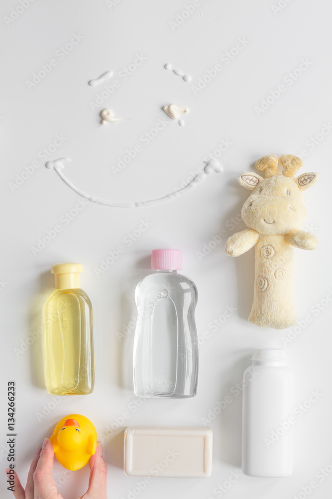 baby accessories for bath with duck on white background