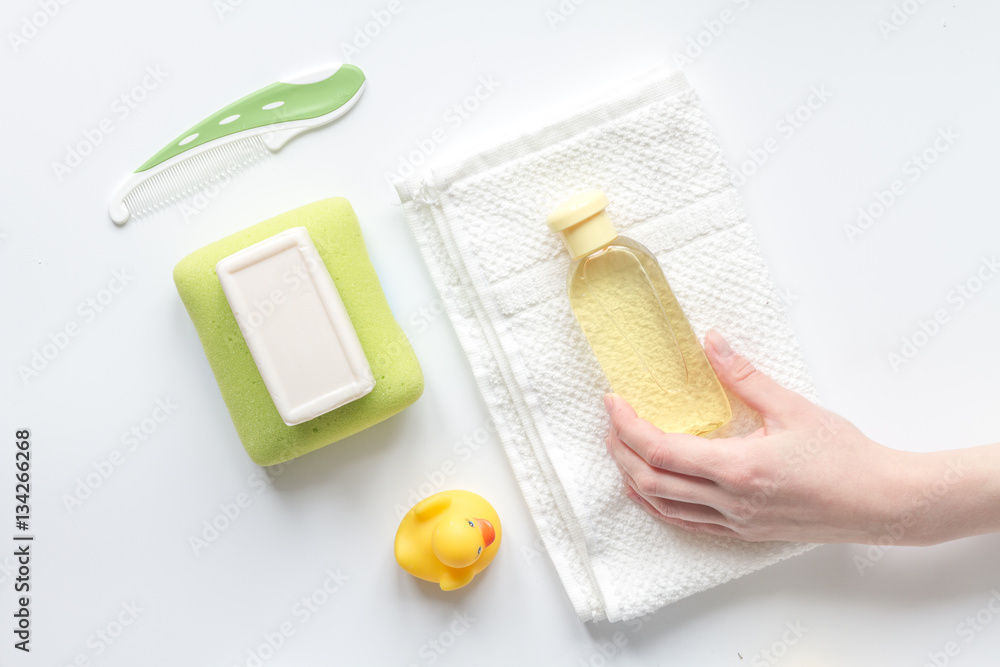 baby accessories for bath with duck on white background