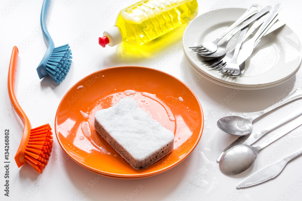 concept of washing dishes on white background