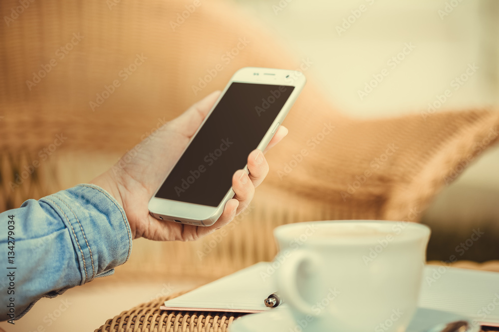 close up smartphone on hand working Businessman working with digital smartphone