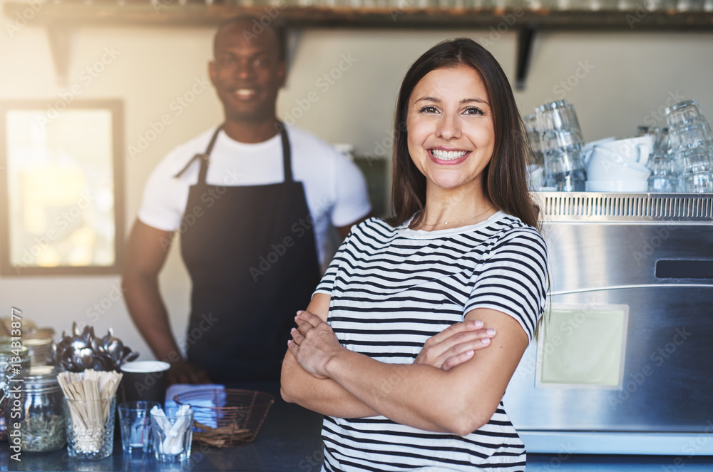 Young female smiling and posing in cafe