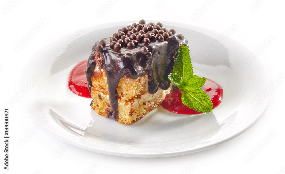 biscuit cake with chocolate and strawberry sauce