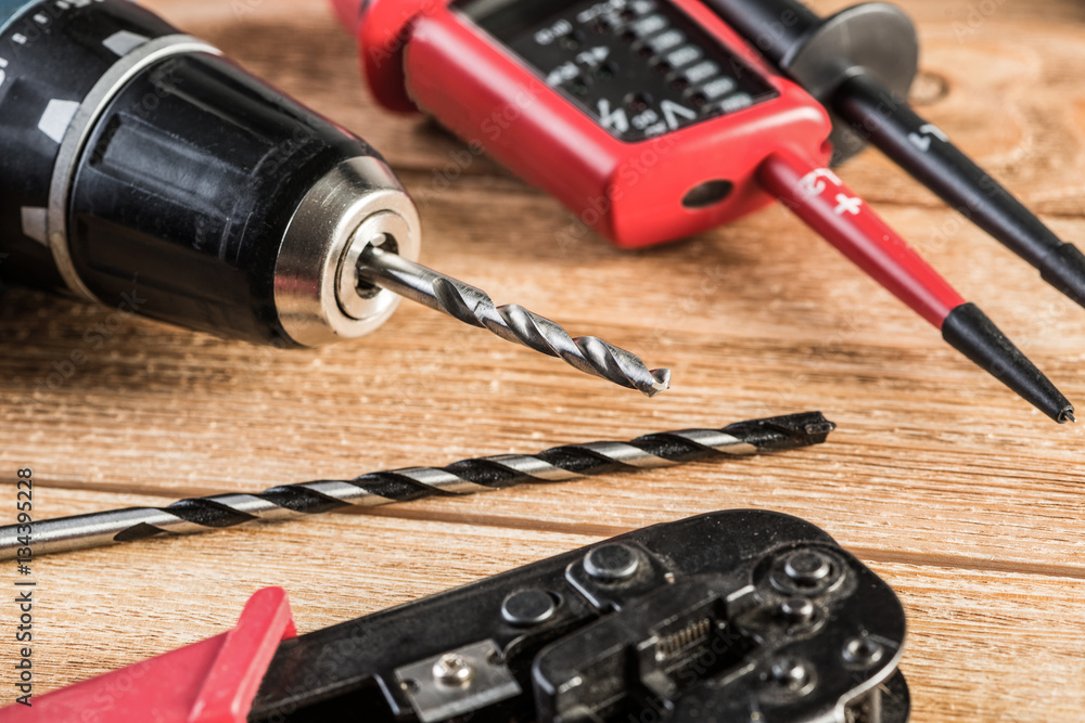 Carpentry tools on wooden surface