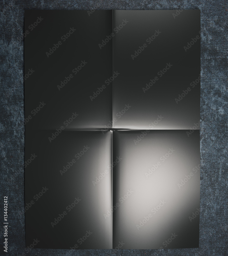 Black paper on concrete surface