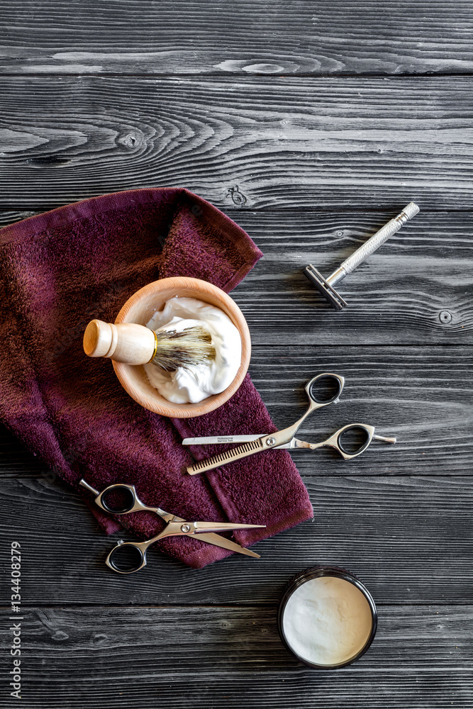 Tools for cutting beard barbershop top view on wooden background