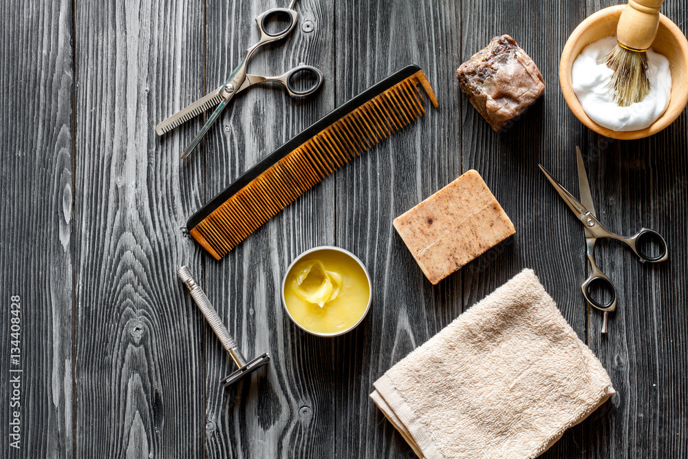 Tools for cutting beard barbershop top view on wooden background