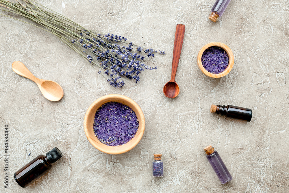 Essential oil and lavender salt with flowers top view