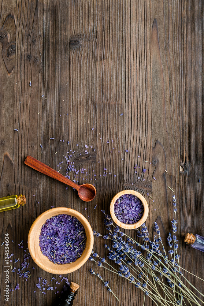 organic cosmetics with lavender on wooden background top view