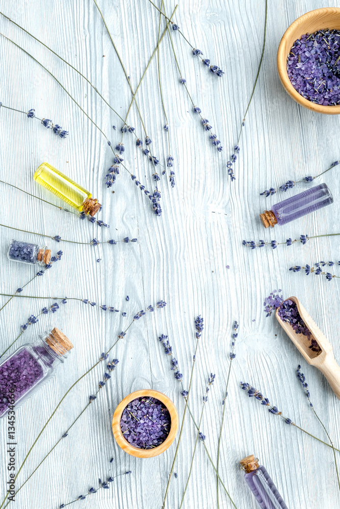 organic cosmetics with lavender on wooden background top view