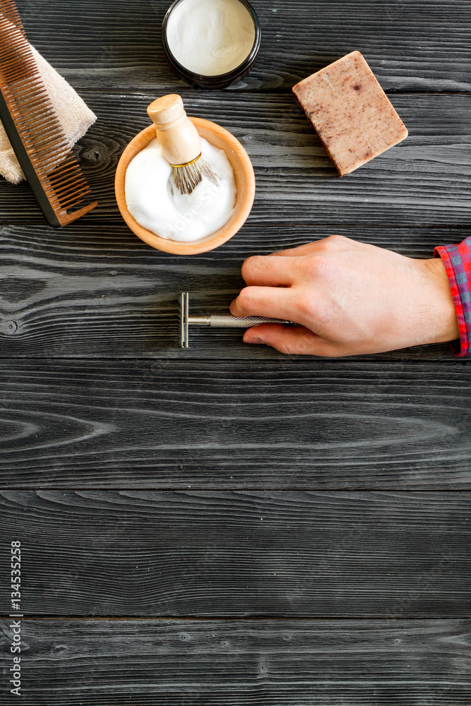 Tools for cutting beard barbershop top view on wooden background