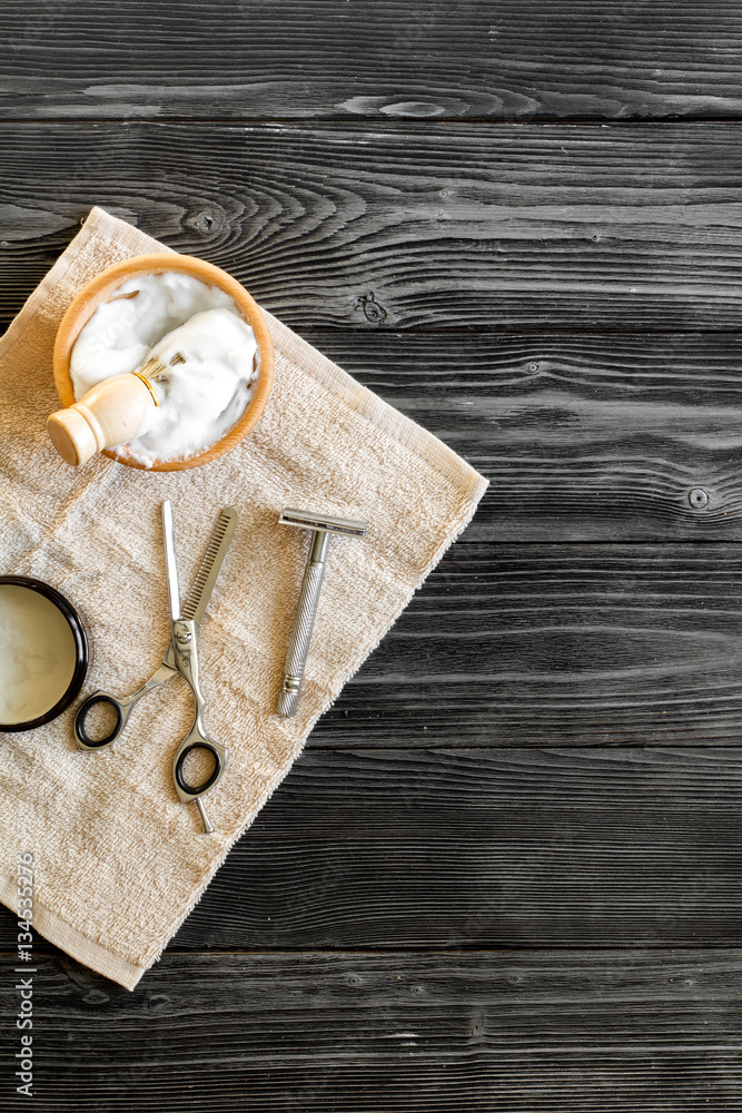 Tools for cutting beard barbershop top view on wooden background