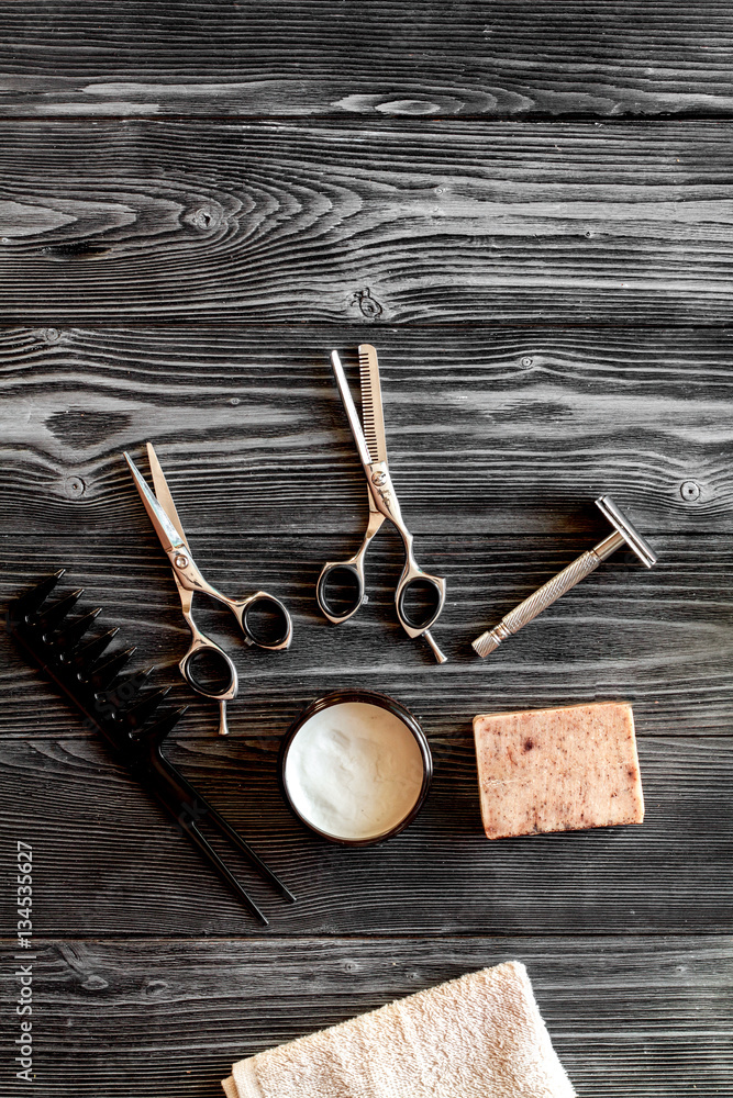 Tools for cutting beard barbershop top view on wooden background