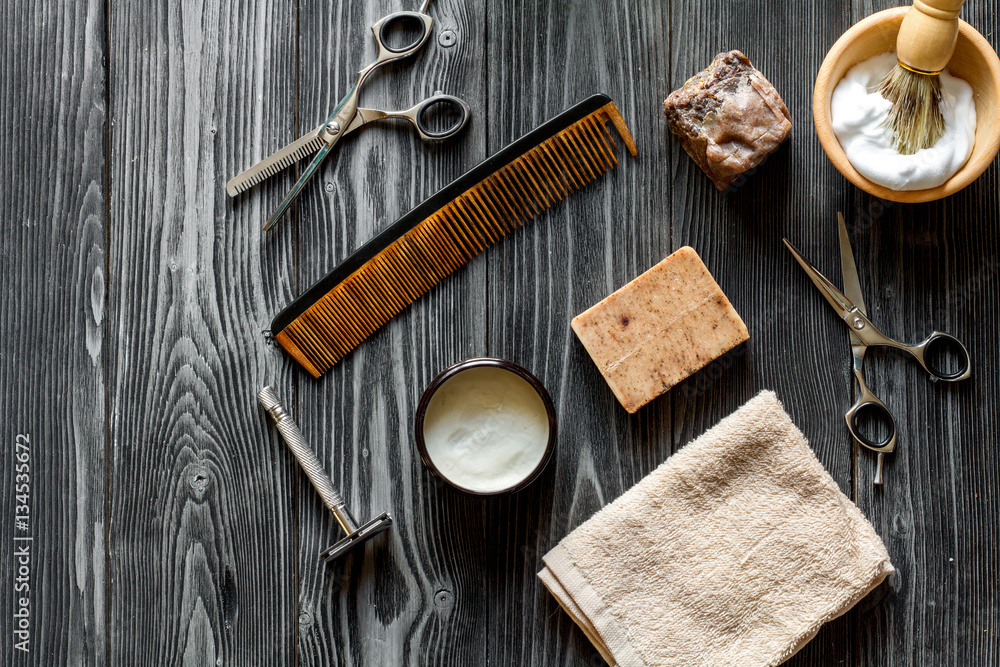 Tools for cutting beard barbershop top view on wooden background