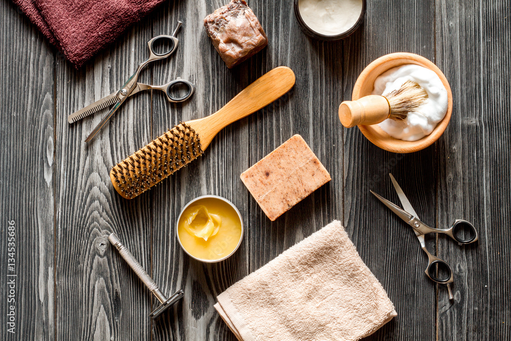 Tools for cutting beard barbershop top view on wooden background