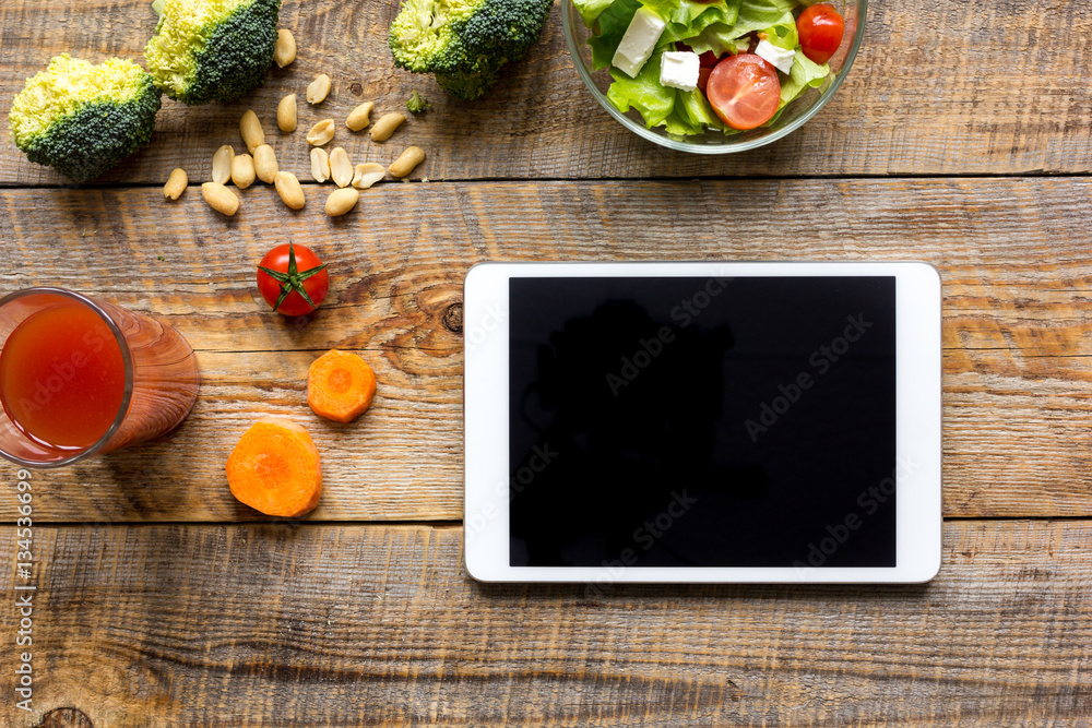 concept diet and tablet with vegetables mock up