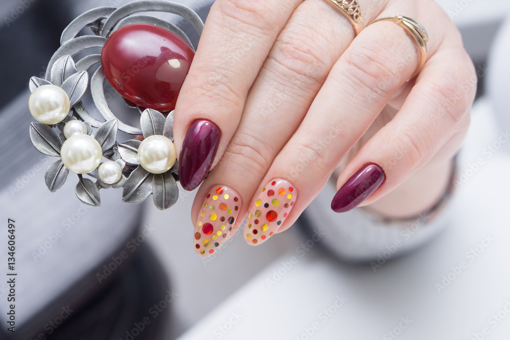 Hands and natural nails, ideal clean manicure. Decorated with stylish elements