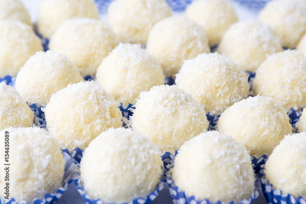 Homemade coconut cookies in paper holders