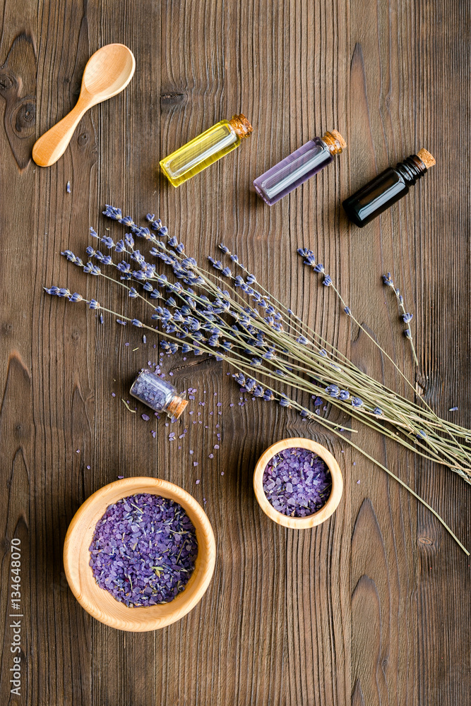 organic cosmetics with lavender on wooden background top view