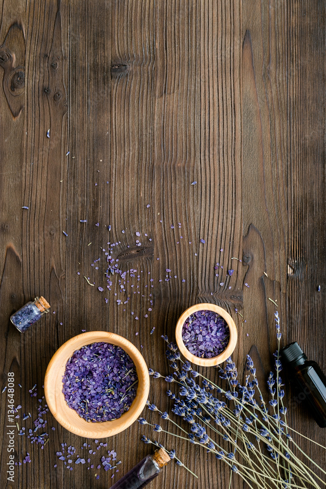 organic cosmetics with lavender on wooden background top view