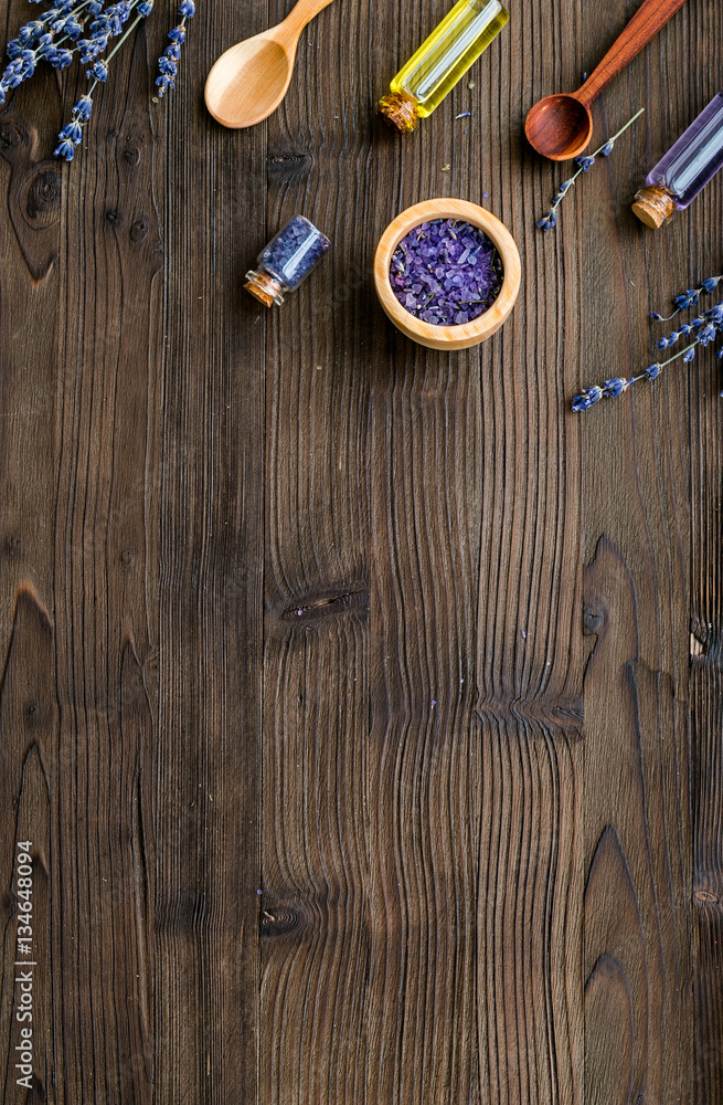 organic cosmetics with lavender on wooden background top view