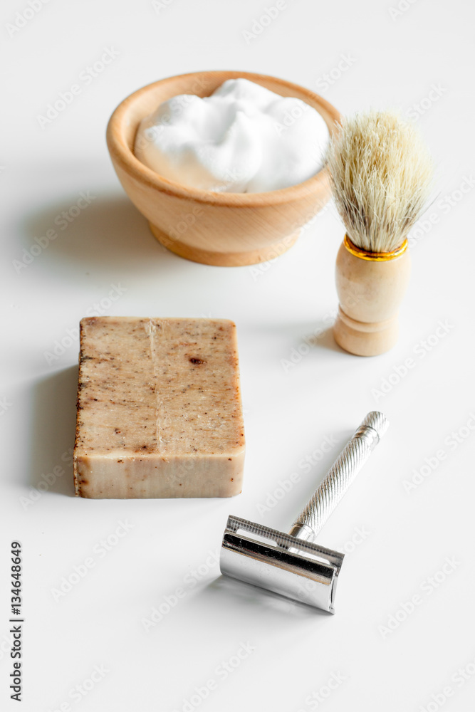 white desktop with tools for shaving beards